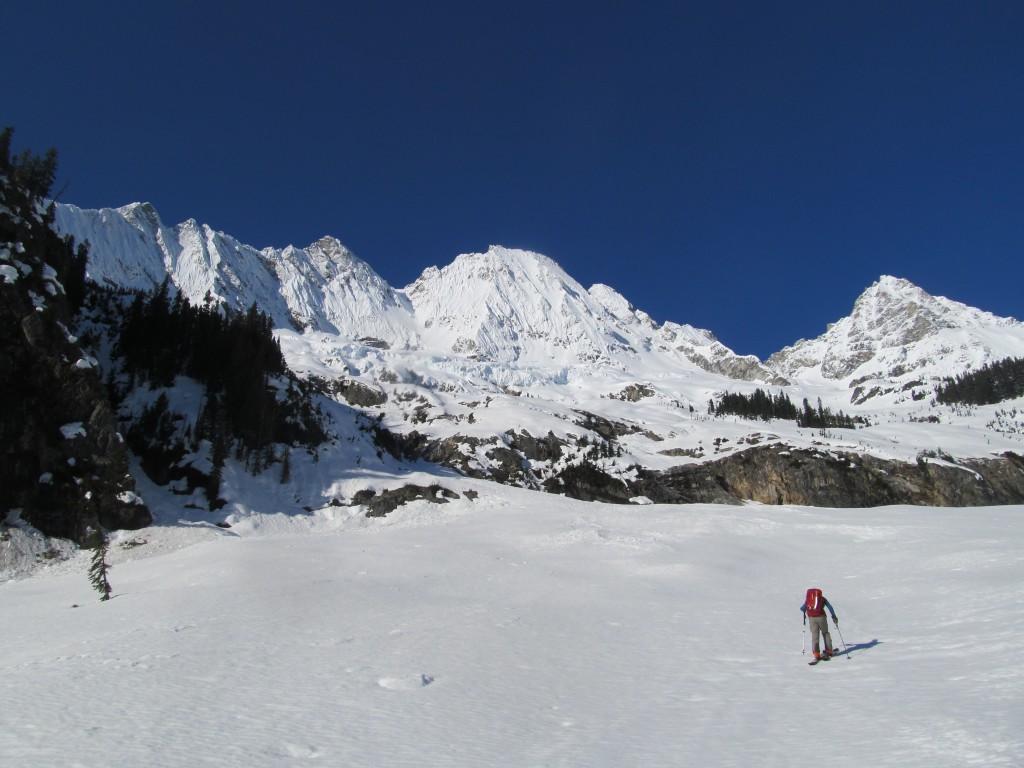 Scott skinning below the cliff band with Goode nearly a mile above