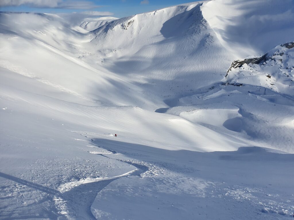 Enjoying powder turns in the sidecountry of 25km ski center