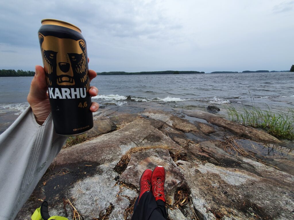 Enjoying a can of Karhu on Laukansaari