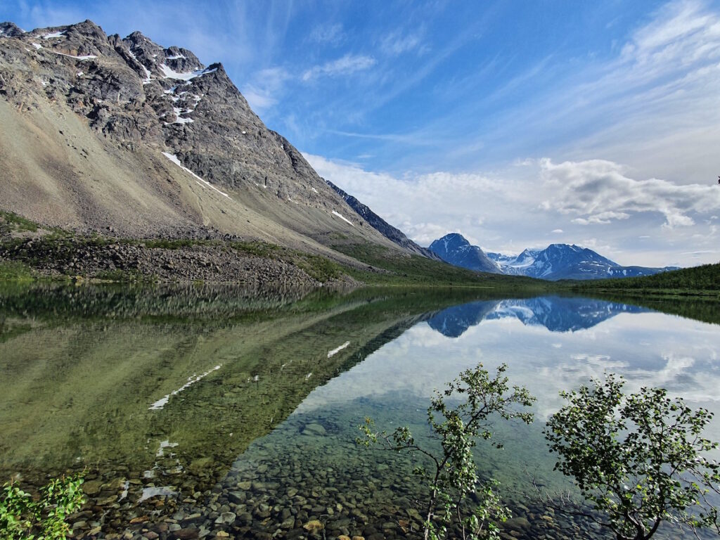 A beautiful lake summer hiking in the Lyngen Alps