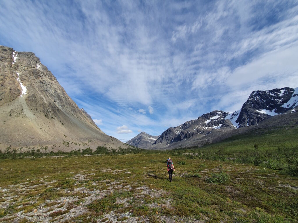 Heading up the valley summer hiking in the Lyngen Alps