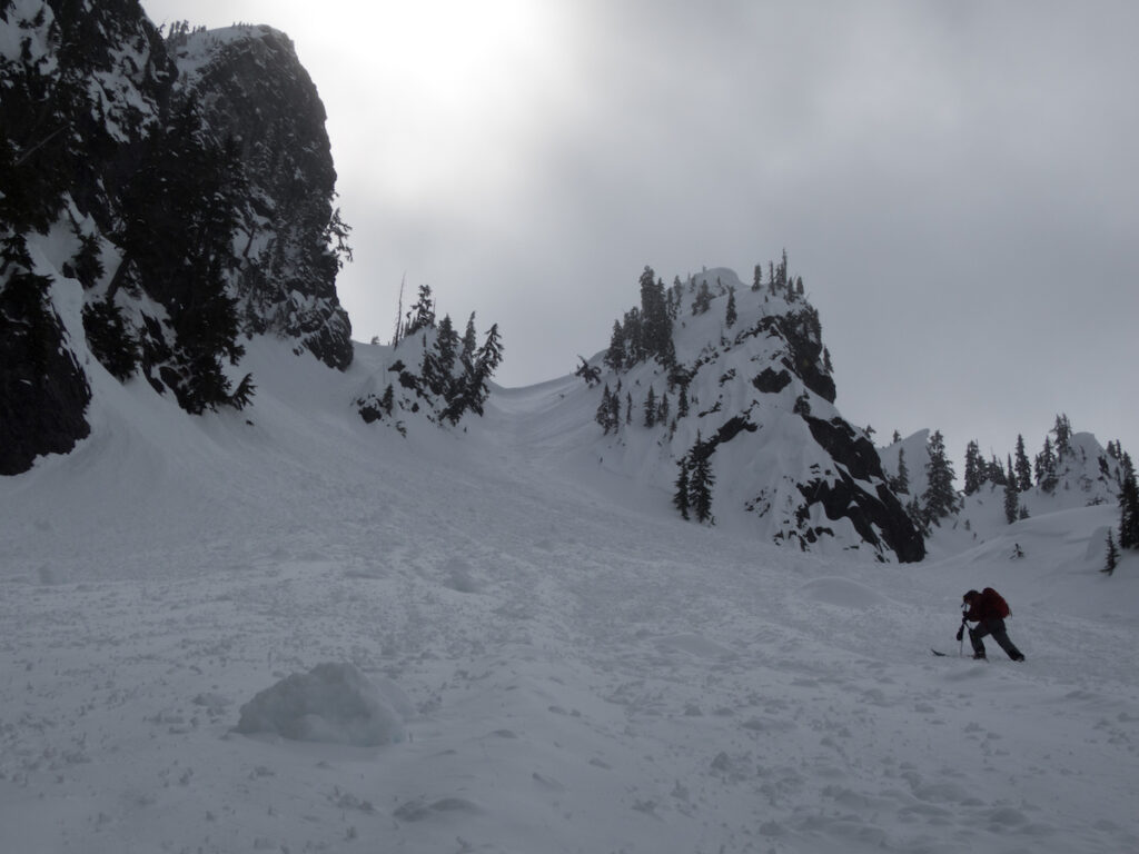 Skinning back up the base of the Kendall Peak Chutes