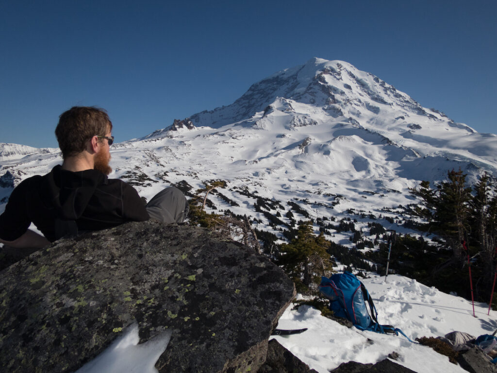 Enjoying the view of Mount Rainier on the summit of Mount Pleasant