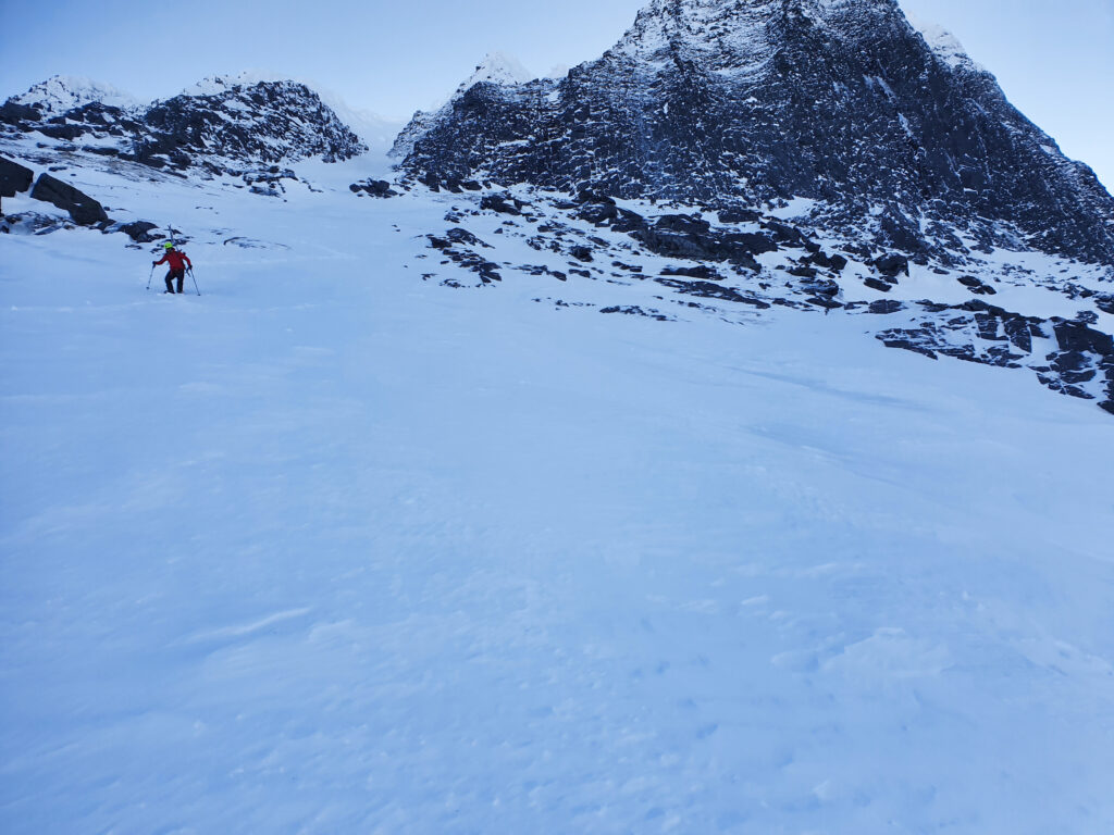 Ben climbing up to check out ski conditions