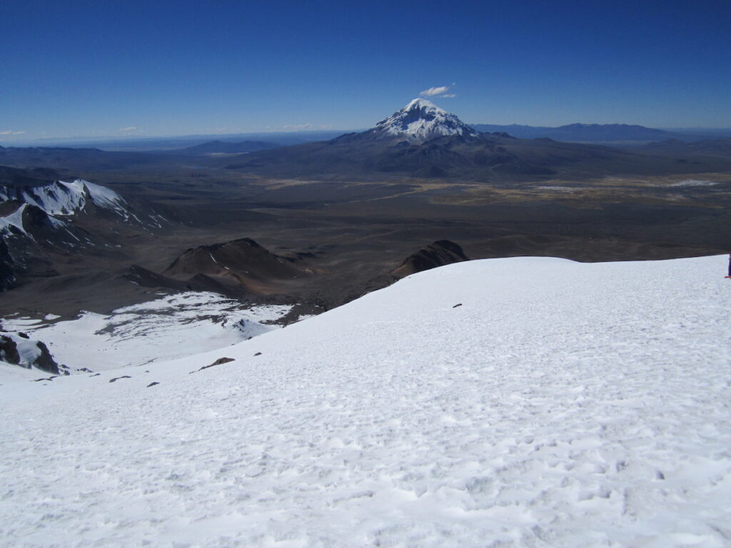 About ready to go Snowboarding in Bolivia with Sajama in the distance