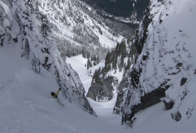 Snowboarding into the Slot Couloir in the Snoqualmie Pass Backcountry