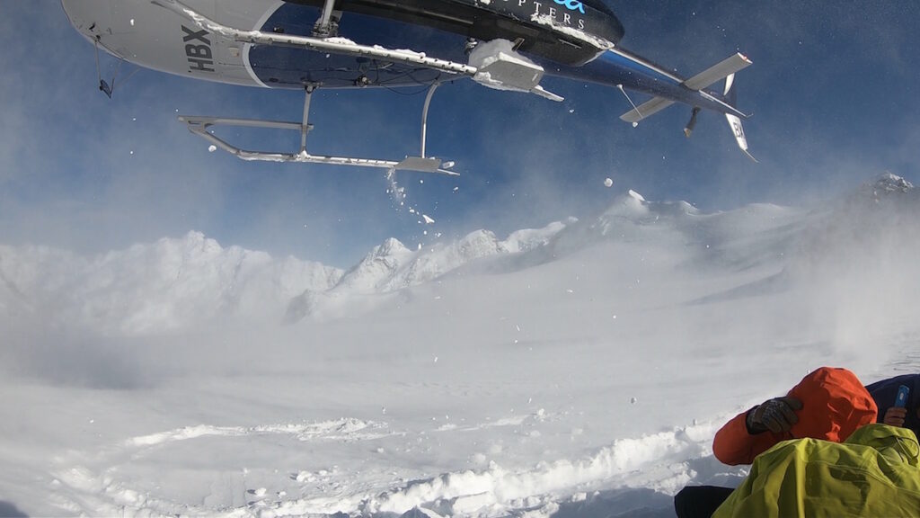 The helicopter taking off near Tasman Saddle on the Tasman Glacier