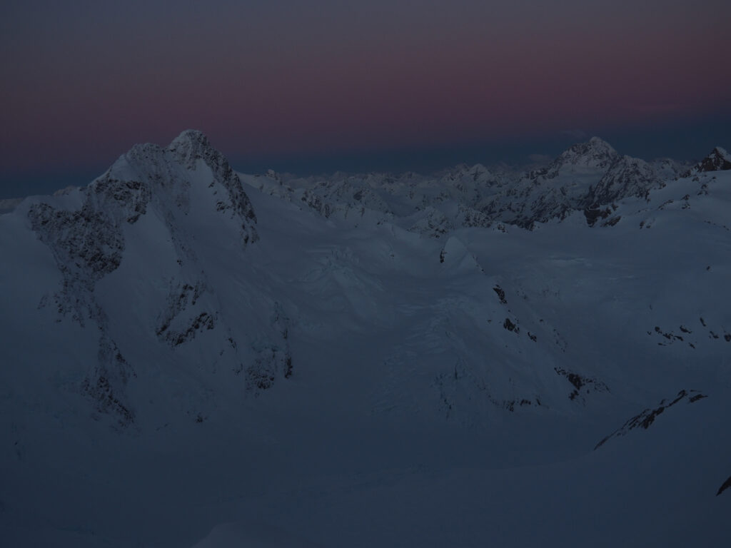 Sunset view into the Southern Alps of New Zealand from the Kelman Hut