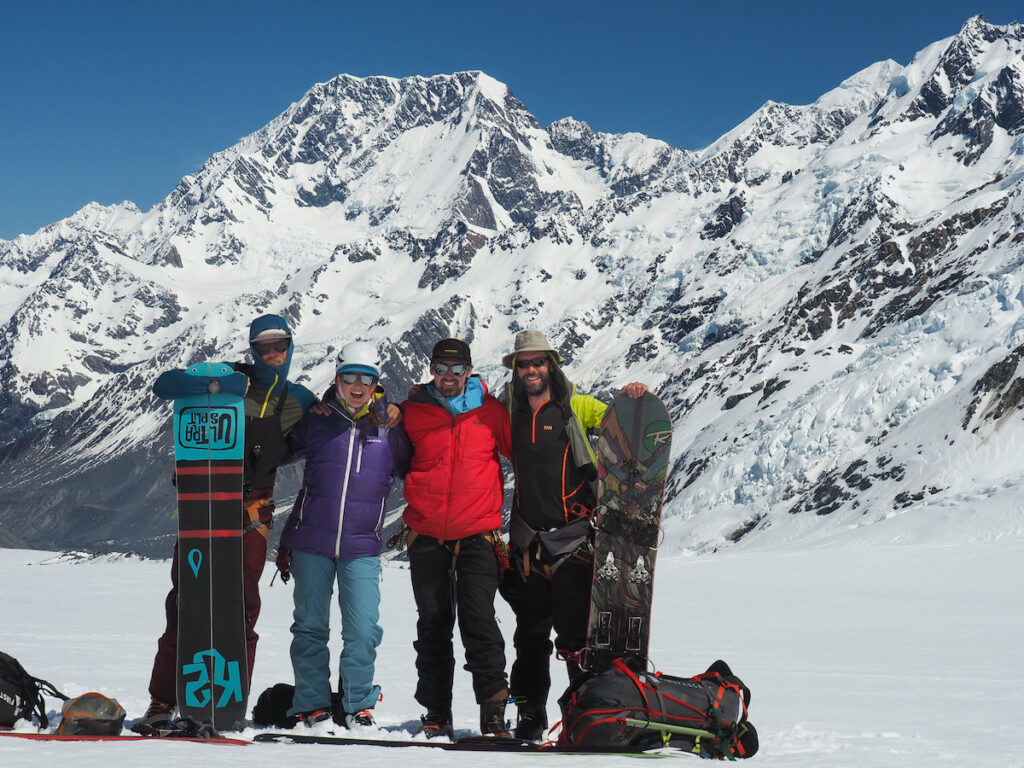 A group photo after four days touring on the Tasman Glacier with Mount Cook in the background