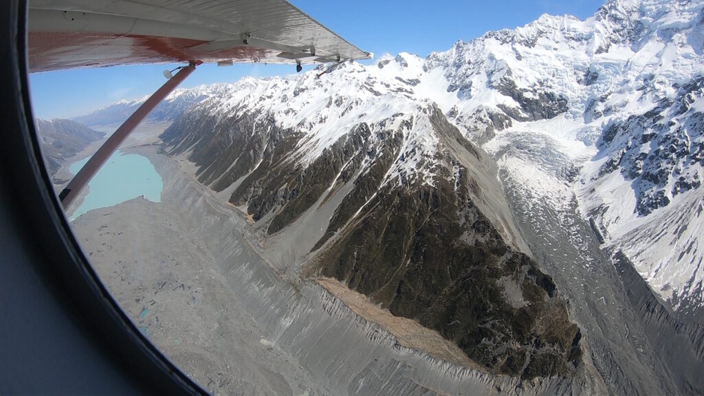 Flying by Mount Cook with Tasman Lake in the distance