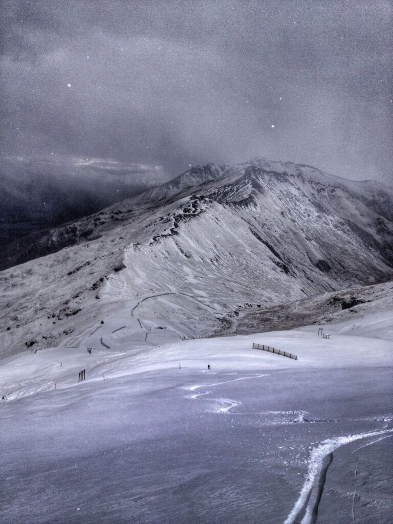 Putting in first tracks down the backside of Treble Cone