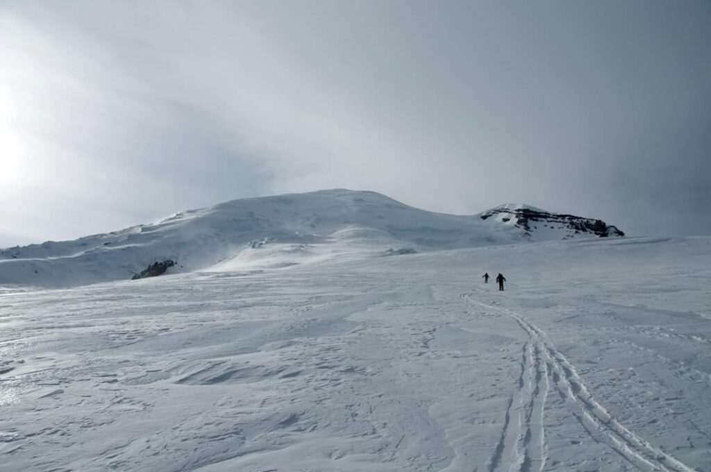 Battling the winds while breaking trail up the Emmons Glacier