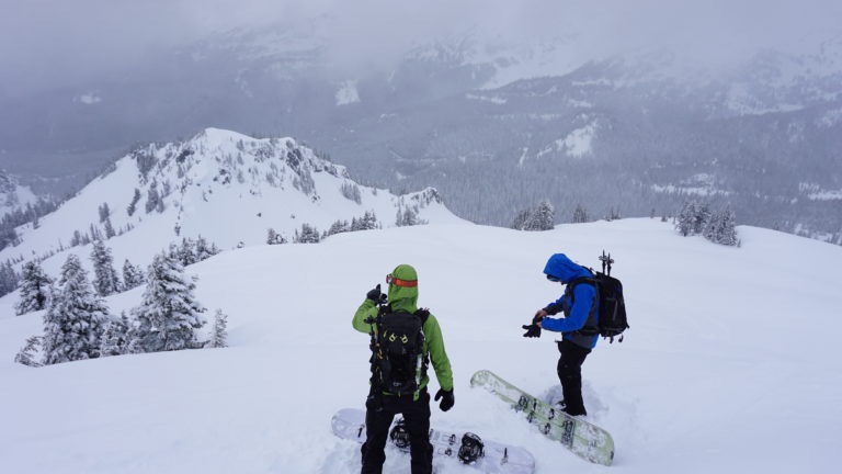 Getting ready to Snowboard down towards Cliff Lake from Plummer Peak on the Tatoosh Traverse