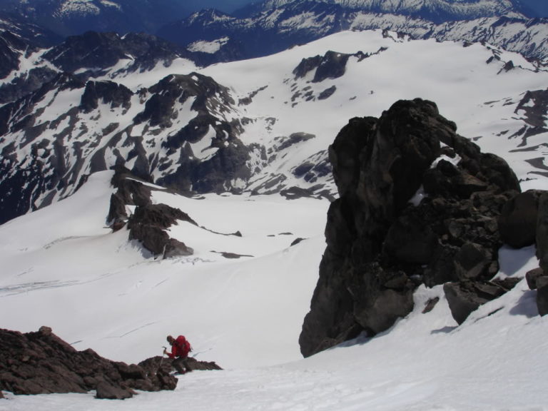 Jason drops in first to the Cool Glacier Headwall on Glacier Peak