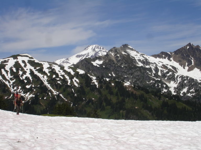 Heading towards Indian Pass with Glacier Peak in the background