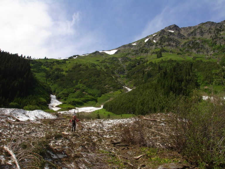  Enjoying the last bit of snow hiking through Avalanche debris in Indian Creek as we exit the Dakobed Traverse