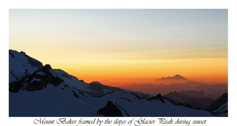 Looking at Glacier Peak and Mount Baker in the distance while camping on Mount Clark