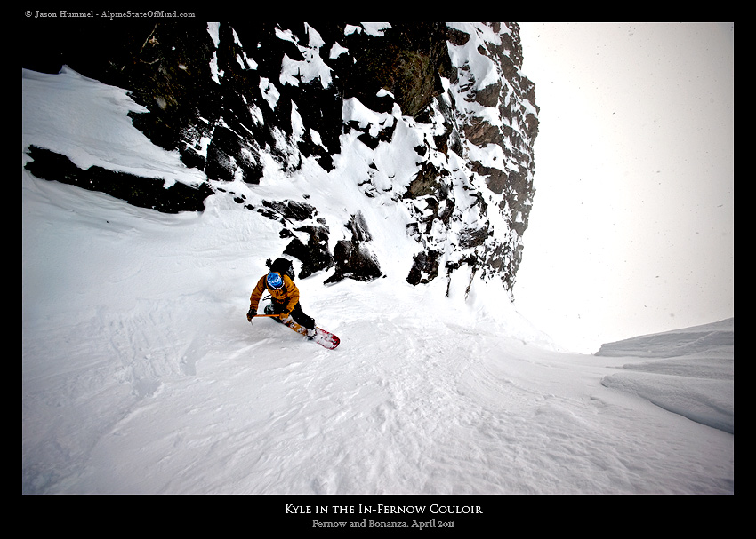 Snowboarding down the northeast couloir off the summit of Mount Fernow near Holden Village in Washington State