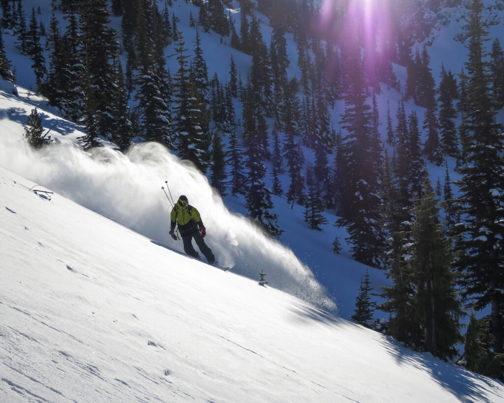 Snowboarding great powder in Crystal Lakes before heading out to the Sheep Lake Couloir