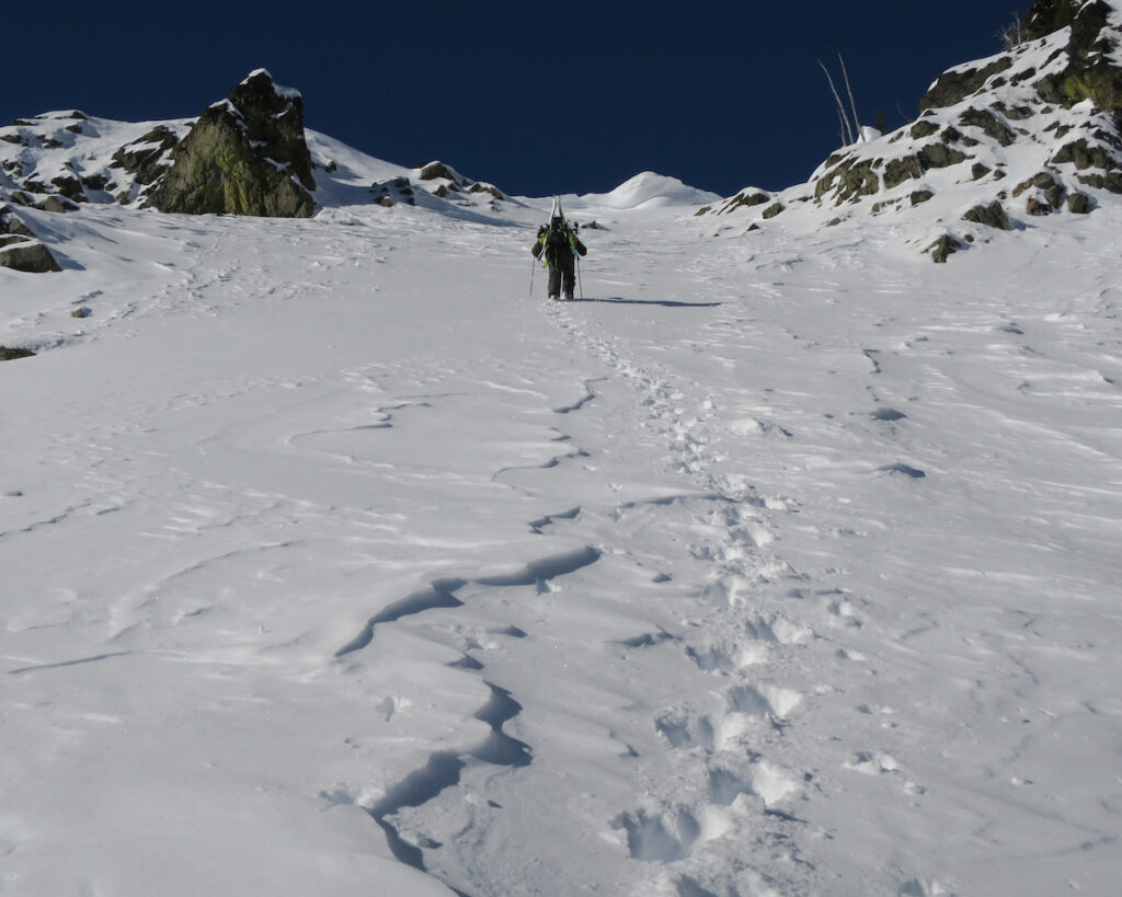 Climbing up Crystal Peak before heading out to the Sheep Lake Couloir