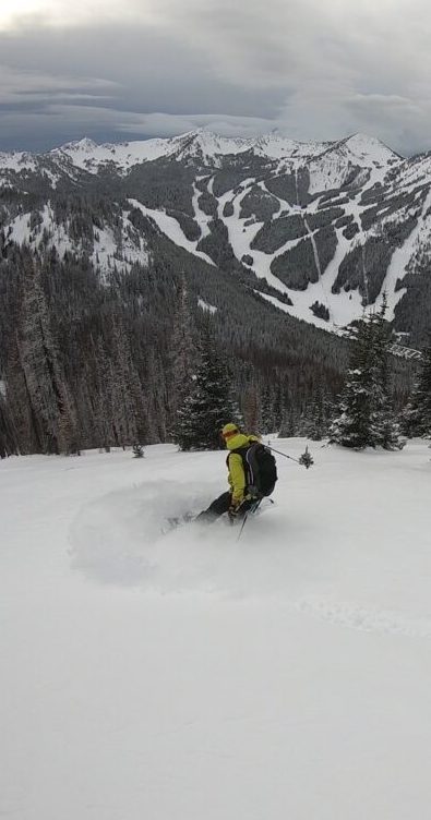 Snowboarding down East Peak in the Crystal Mountain Backcountry