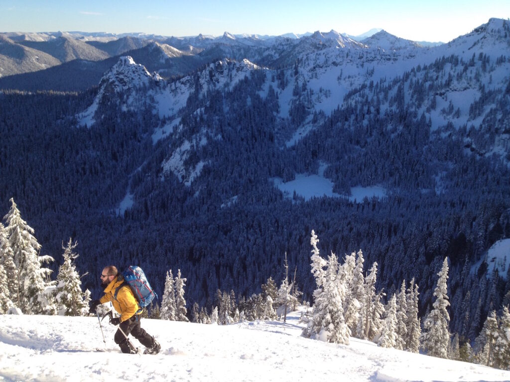 Ski touring back up to Dog Leg Peak with Morse Creek Basin in the background