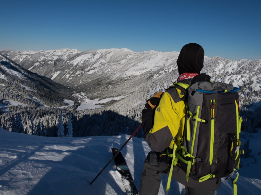 Looking into the Crystal Mountain backcountry while standing on the summit of Dog Leg Peak