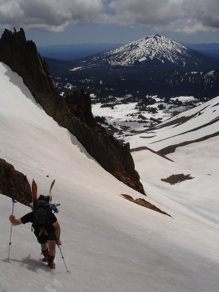 Climbing  the 3 o’clock couloir with Bachelor in the background