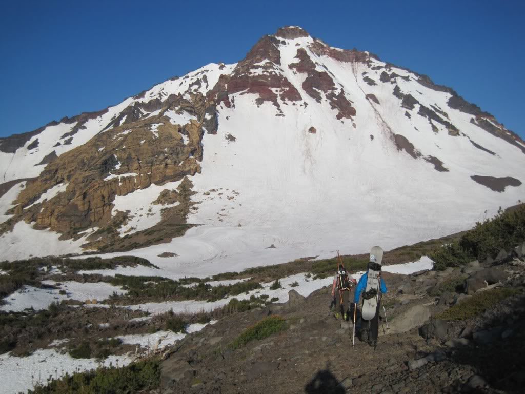 Heading out to snowboard the North Sister via the Early Morning Couloir with it in the background