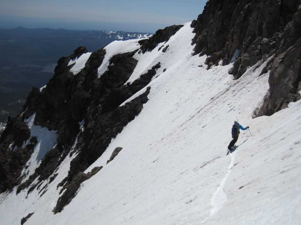 Snowboarding over to the top of the Early Morning Couloir