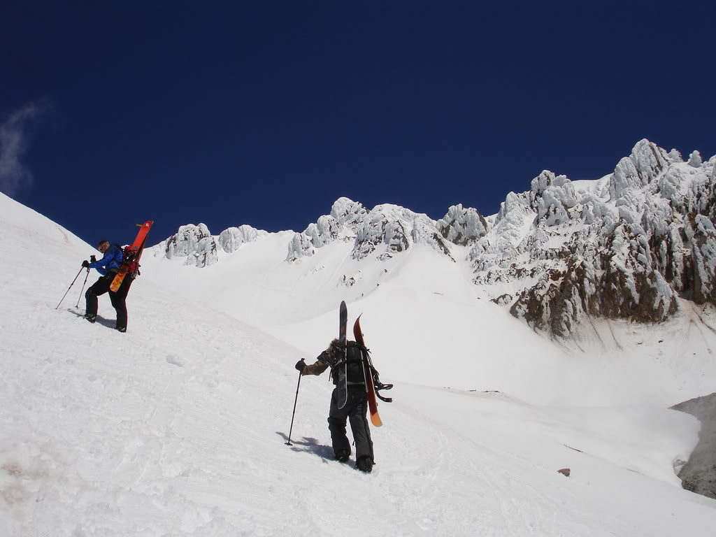 Climbing Mount Hood with a clear view of Hogsback Ridge and the Old Chute