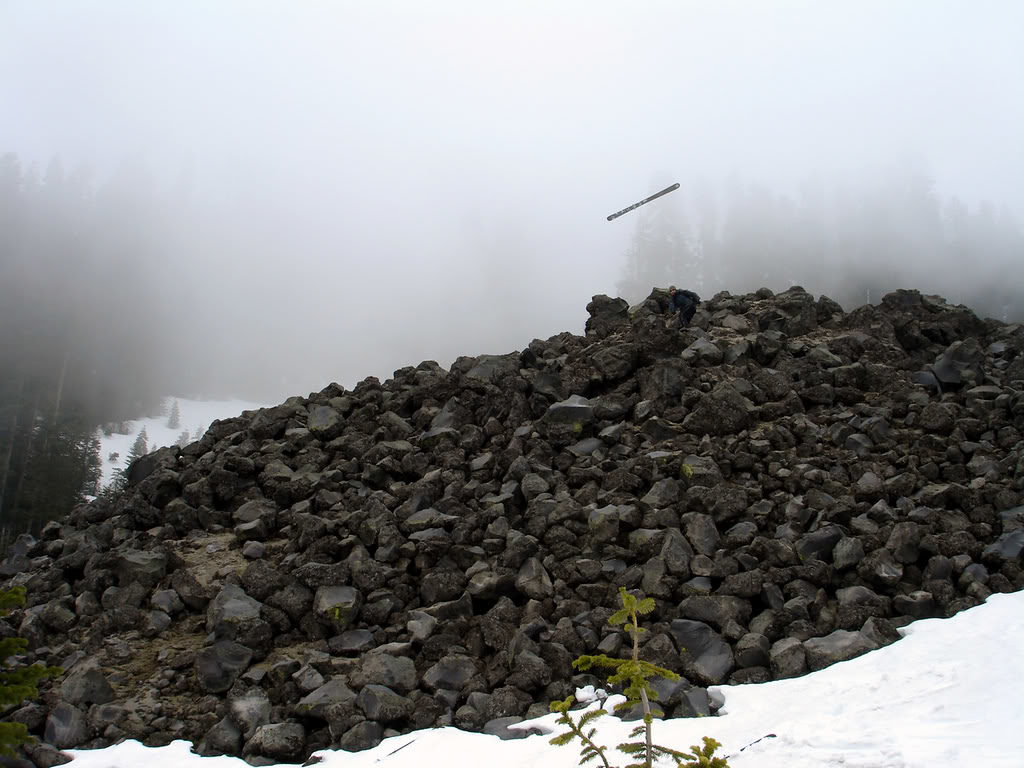 Climbing over a rock ridge on the lower valley of Mount Saint Helens