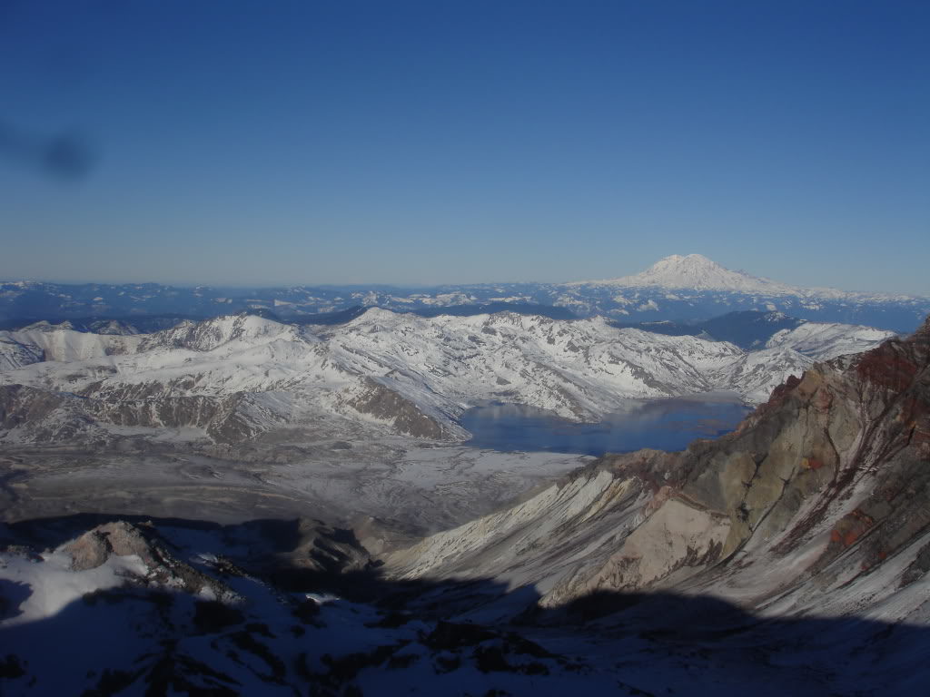 Looking into the devastation zone and Spirit lake with Mount Rainier in the distance