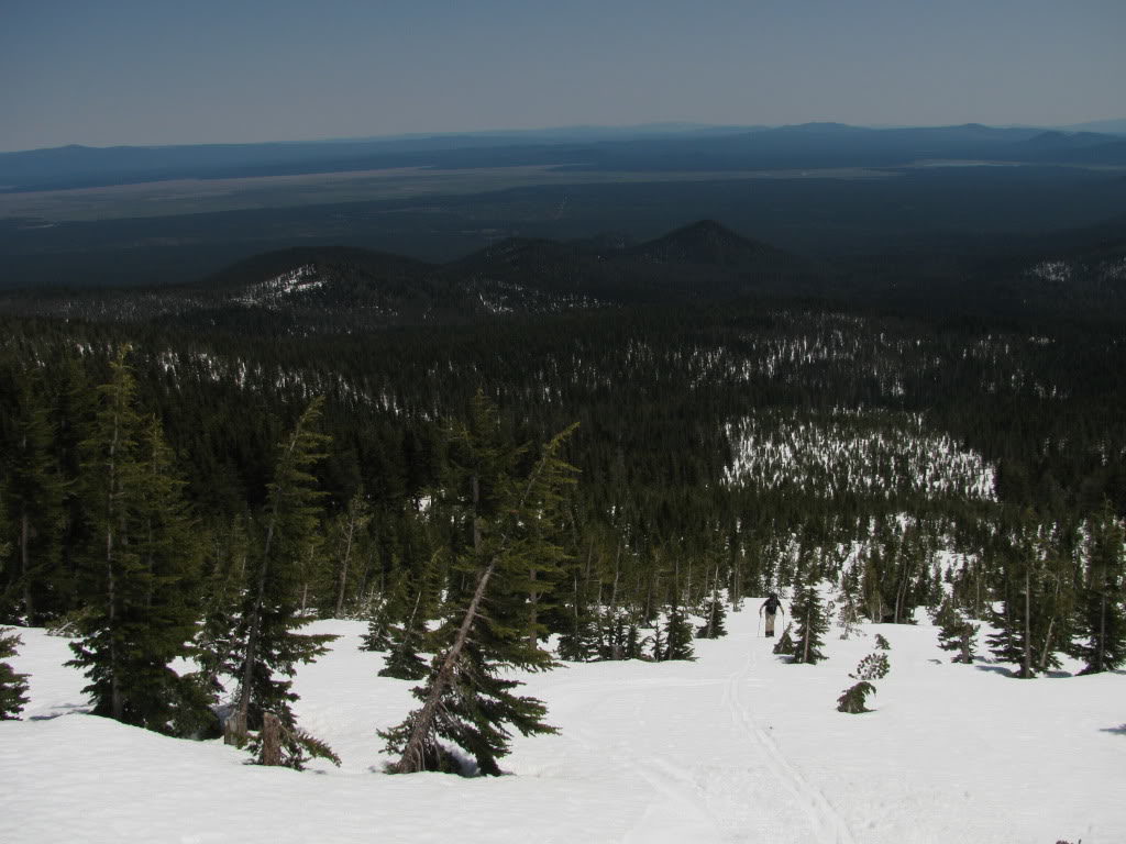 ski touring back up the slopes after a great ski run