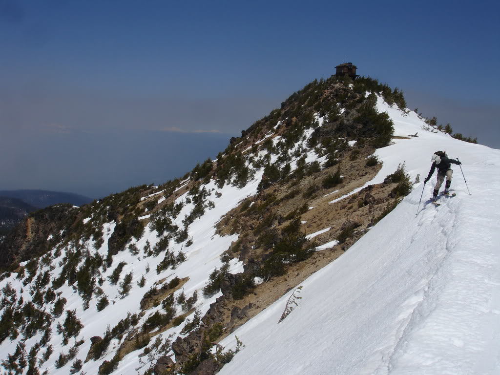 Arriving back on the summit ridge of Mount Scott before skiing down the west bowl