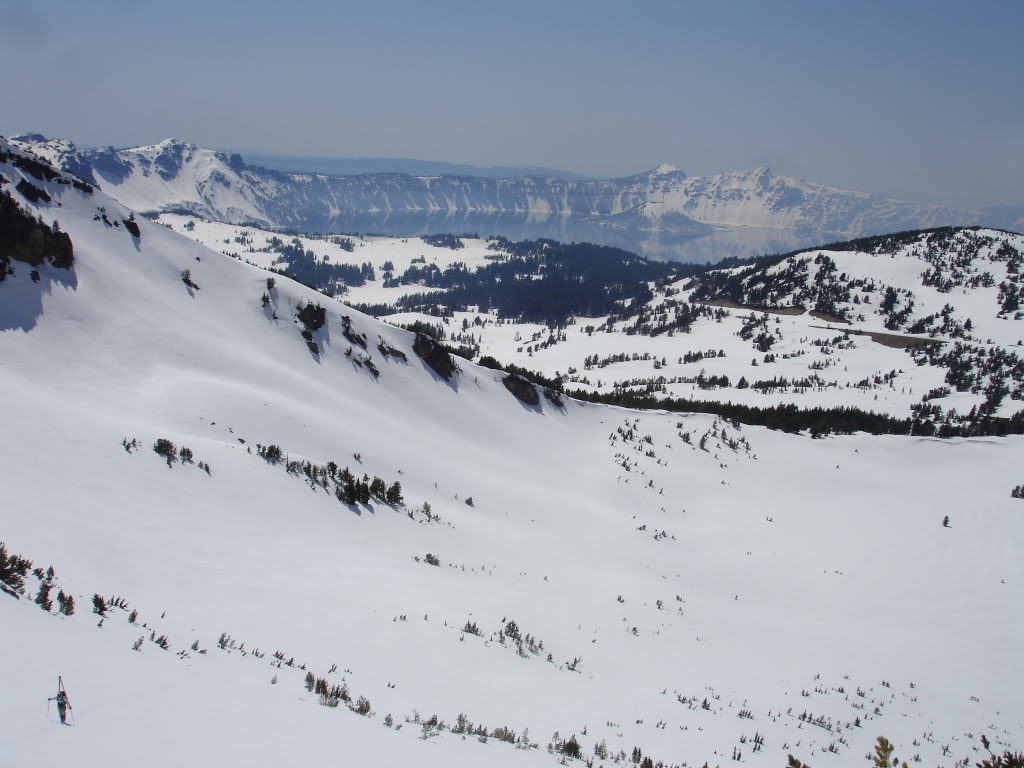 Climbing back up the west bowl of Mount Scott with Crater Lake in the background