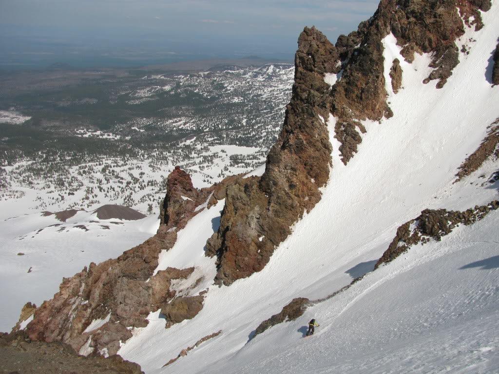 Snowboarding down towards the Prouty Glacier on the east face of the South Sister