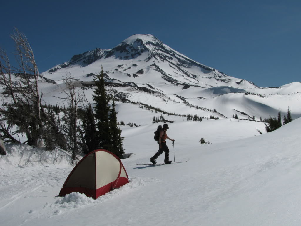 Leaving our tent at Camp Lake while ski touring towards the Middle Sister with the South Sister in the background in Three Sisters Wilderness