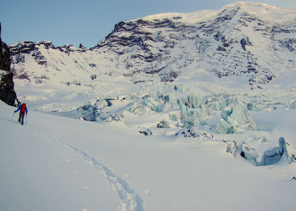 Climbing on the Carbon Glacier while doing a ski traverse in Mount Rainier National Park