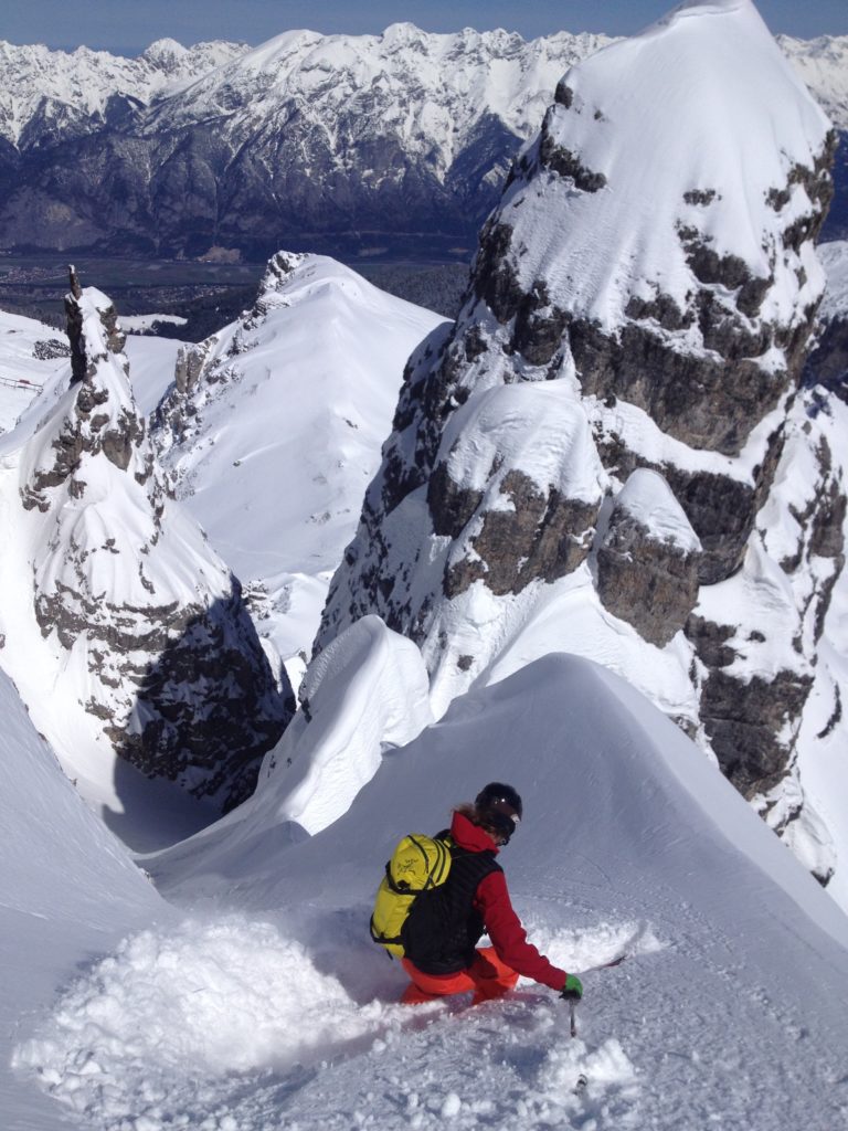 Lorenzo skiing into an aesthetic couloir in the Axamer Lizum Backcountry in the Austrian Alps