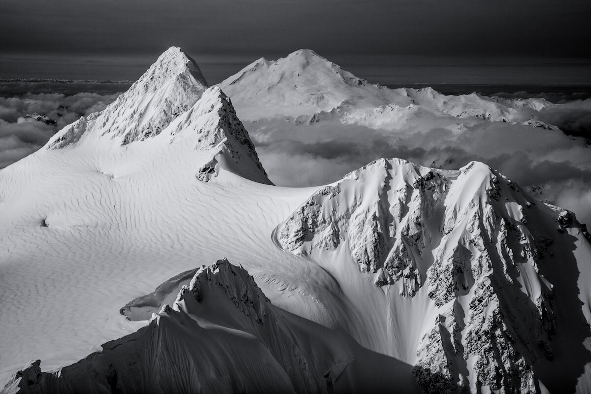 John Scurlock fly by photo of Mount Shuksan and Mount Baker to reprsent ski tours around Highway 542 and Mount Baker in the North Cascades of Washington State