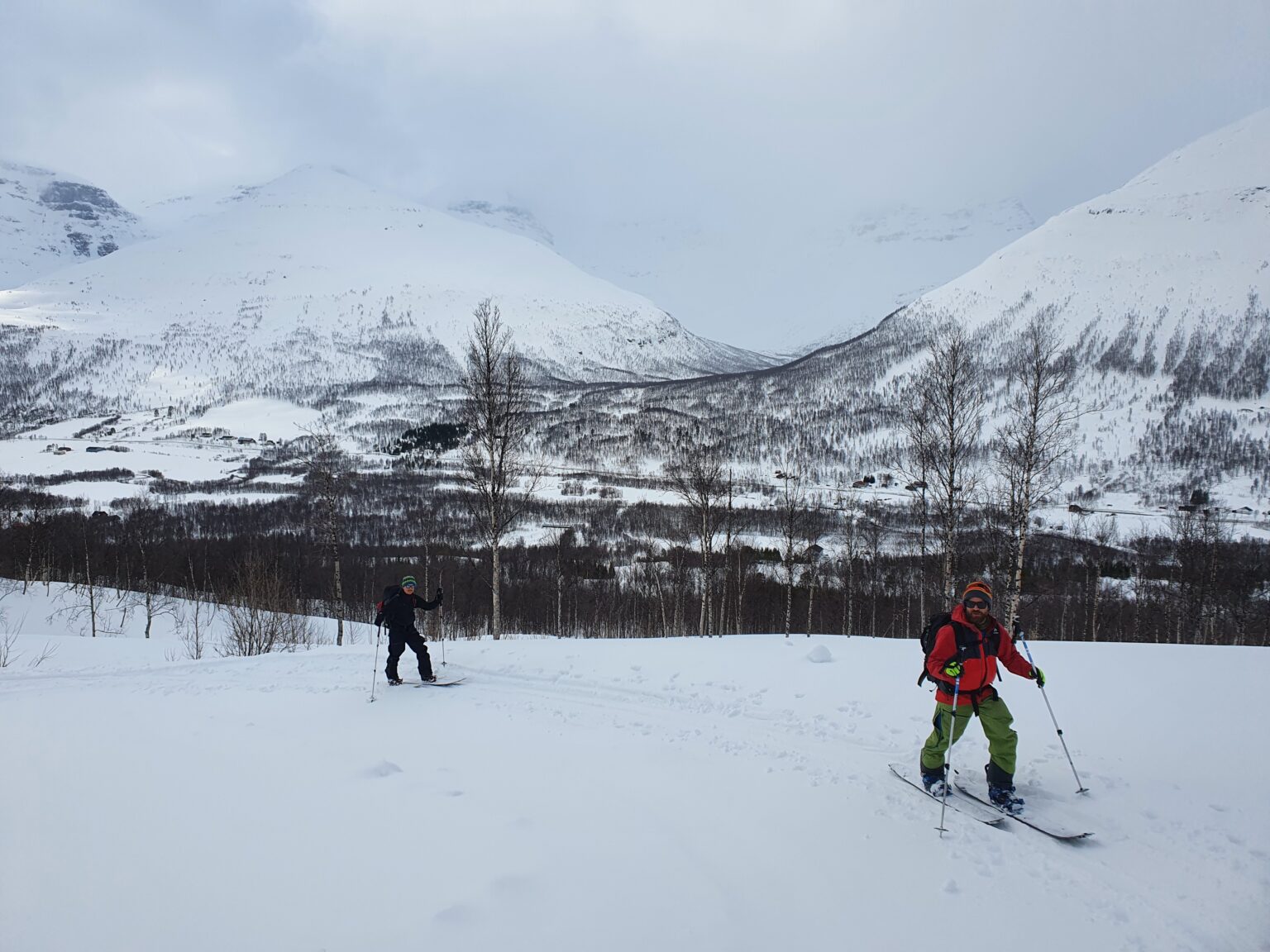 Skinning up the Midteraksia basin with Sjufjellet in the background