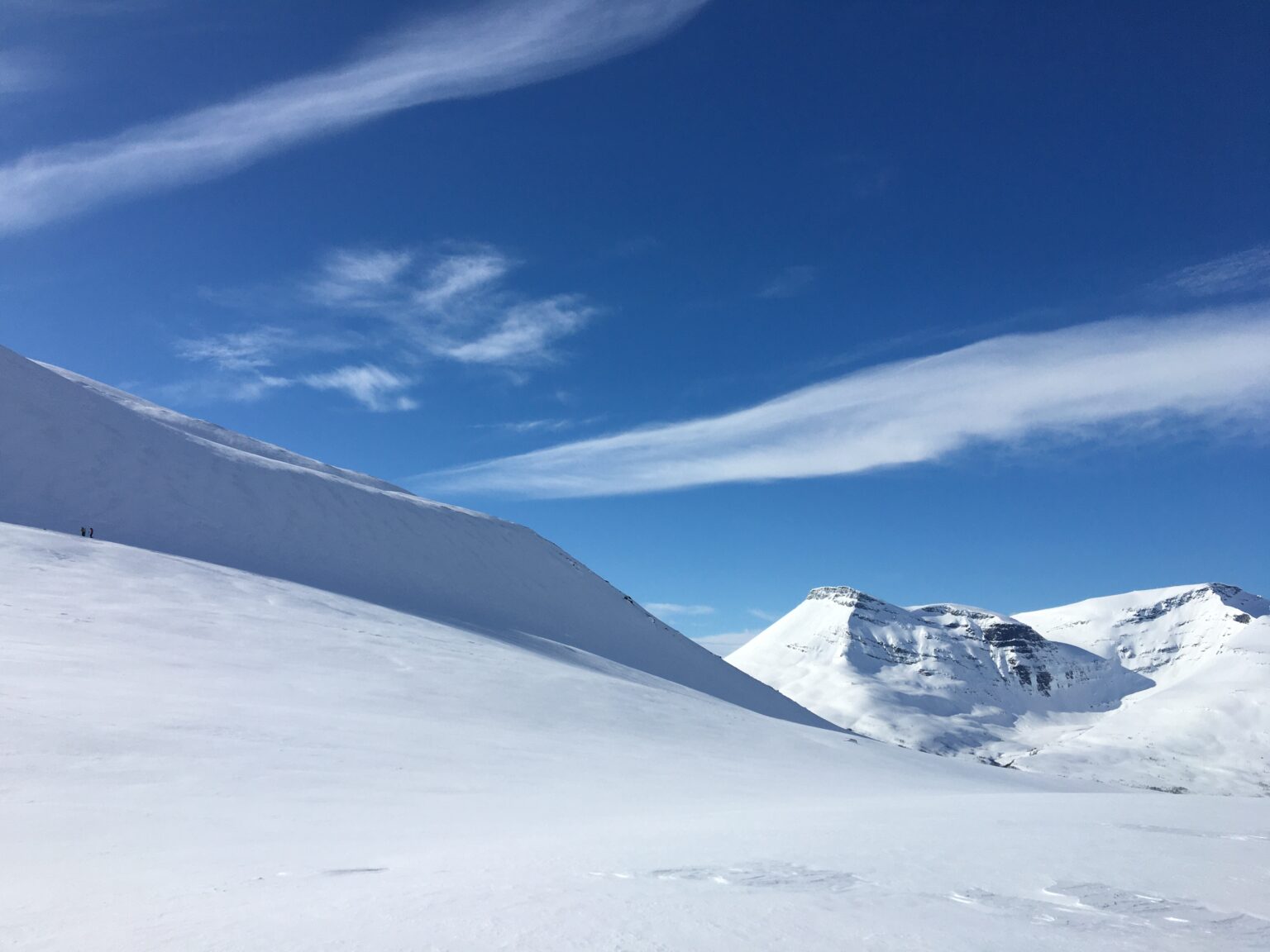 Preparing to ski tour up the crux zone of Isinden Ridge in the Tamokdalen Backcountry
