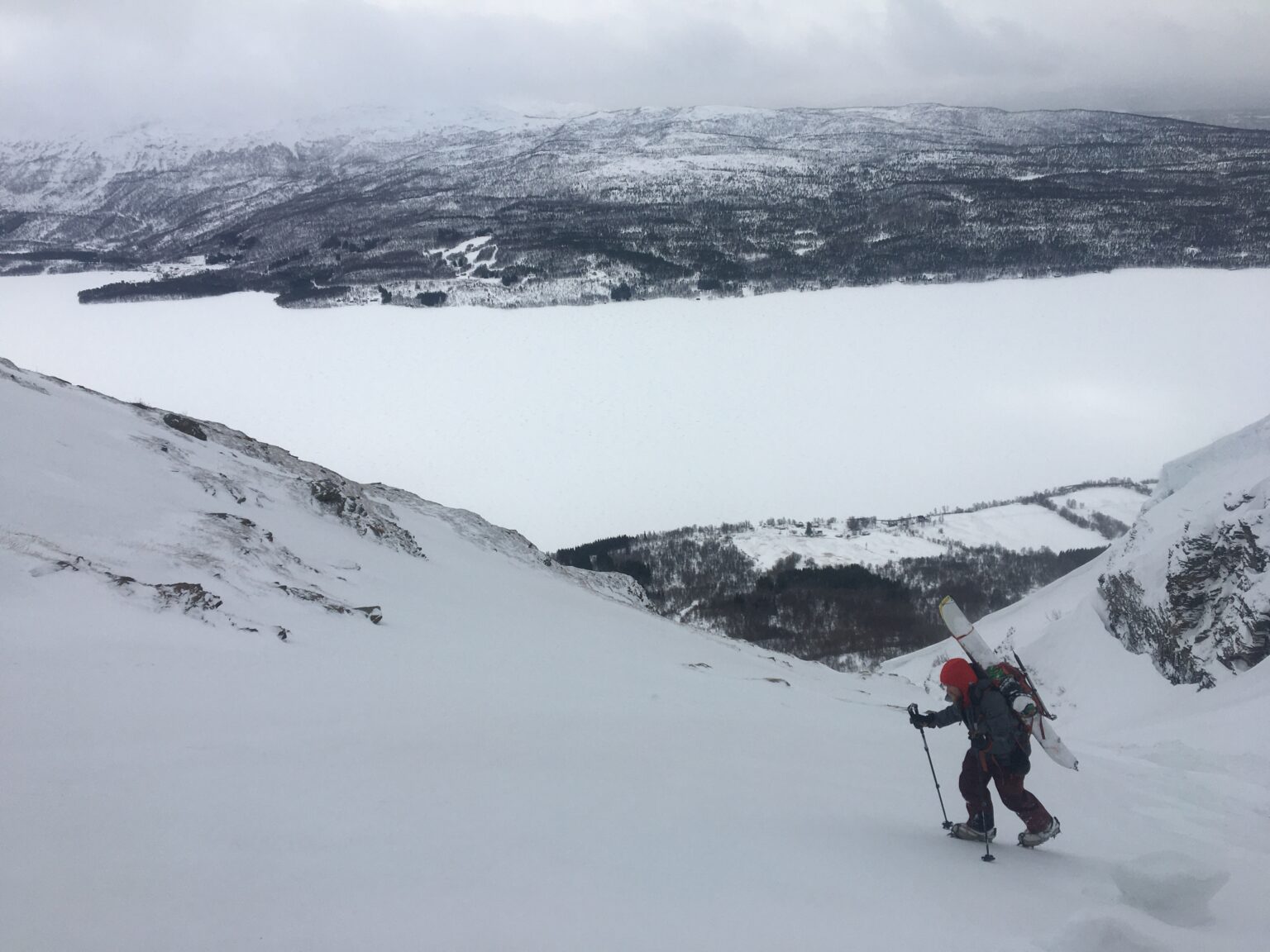 Climbing up the west face of Rostafjellet with Rostavatn in the background