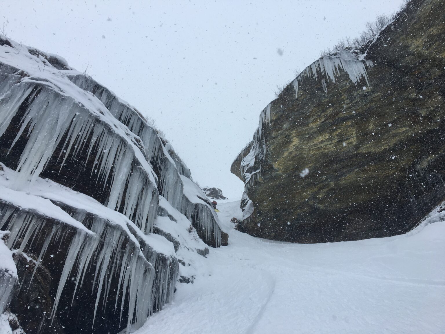 Checking out the upper crux on the lower gully of the West chute of Rostafjellet