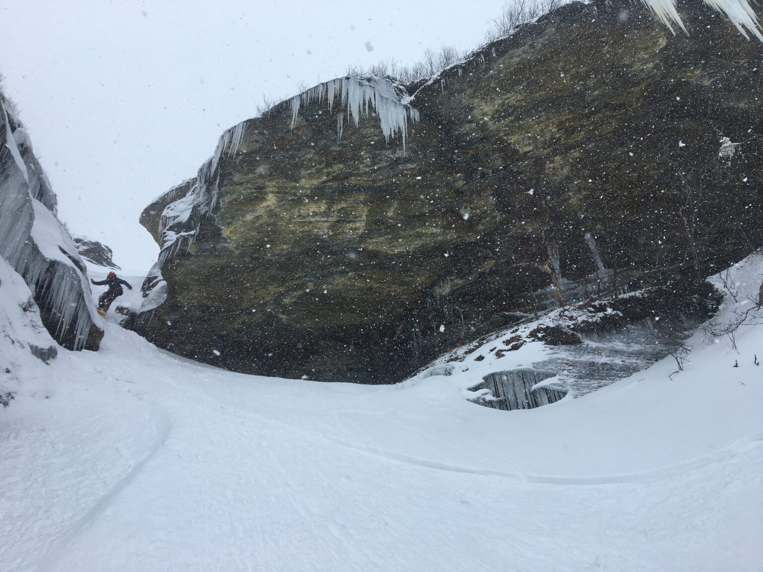 Riding through the crux of the lower gully