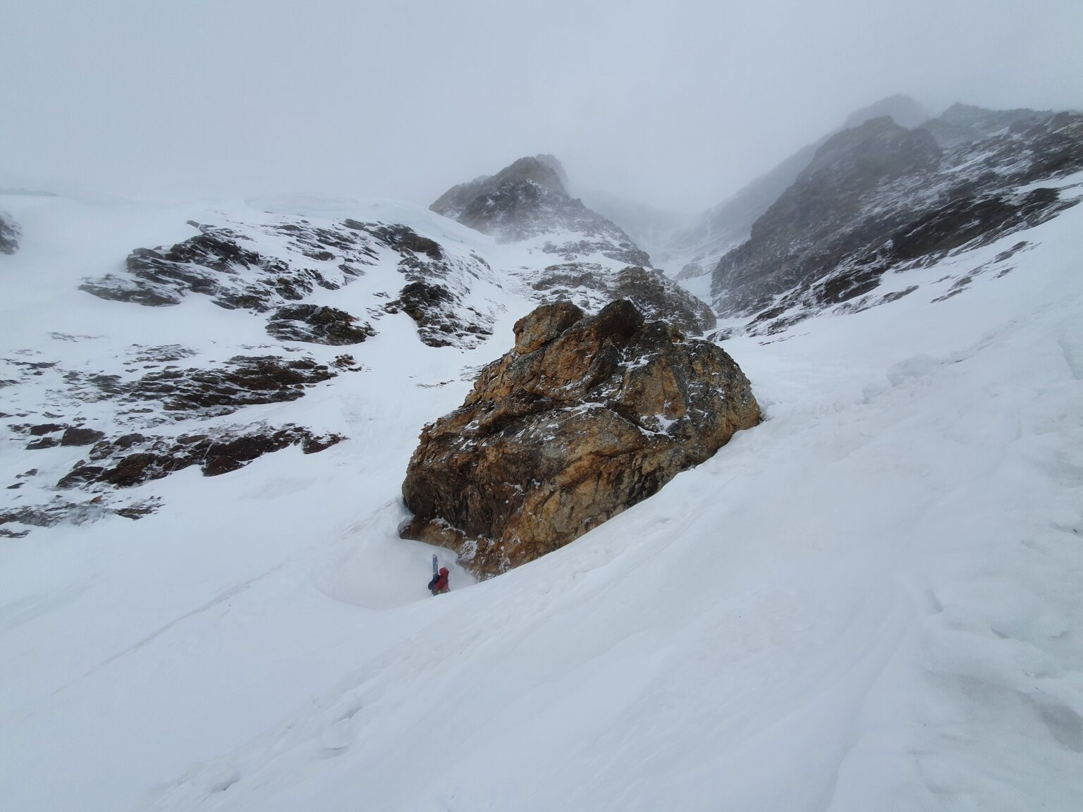 Taking a quick break before climbing the main slopes on the West Couloir of Rostafjellet