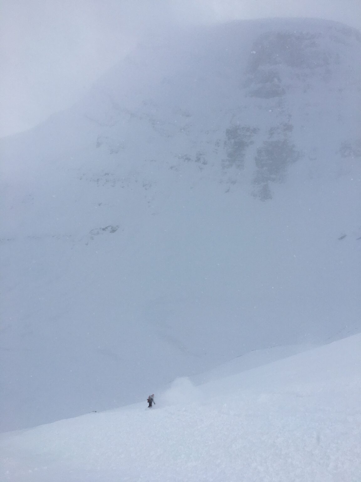 Riding down the West chute of Sjufjellet with Háhttagáisi in the background