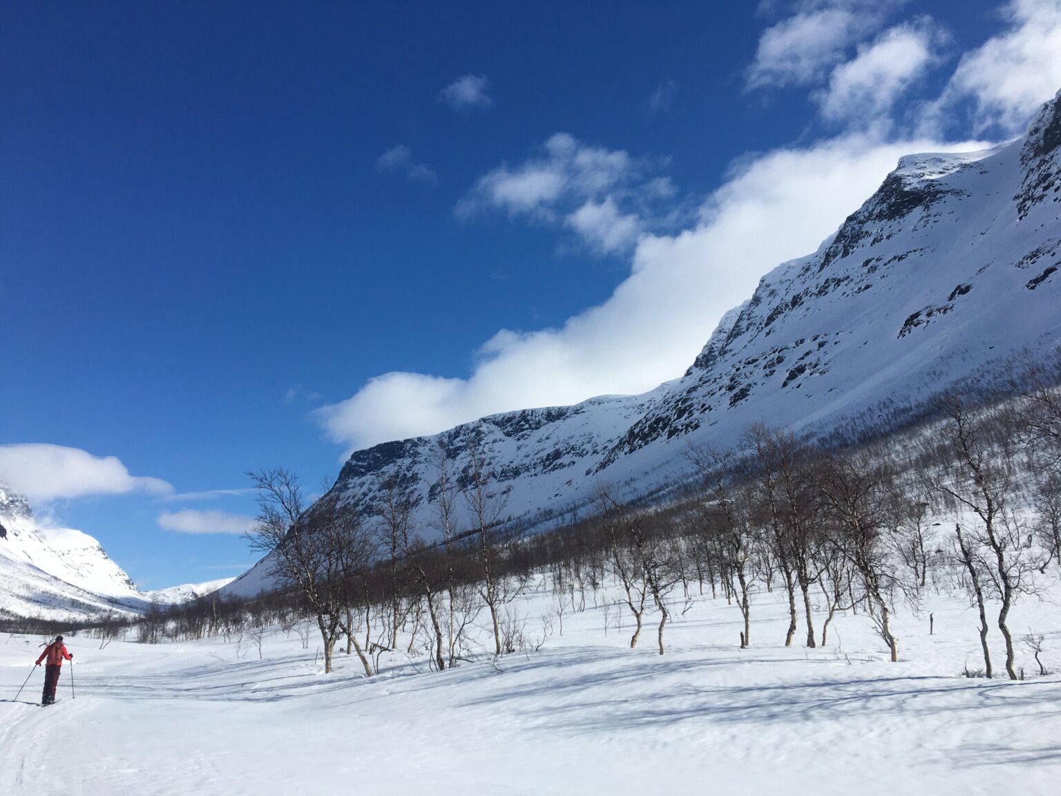 Looking up at Cahcevahnjunni while ski touring through the Vassdalen Valley