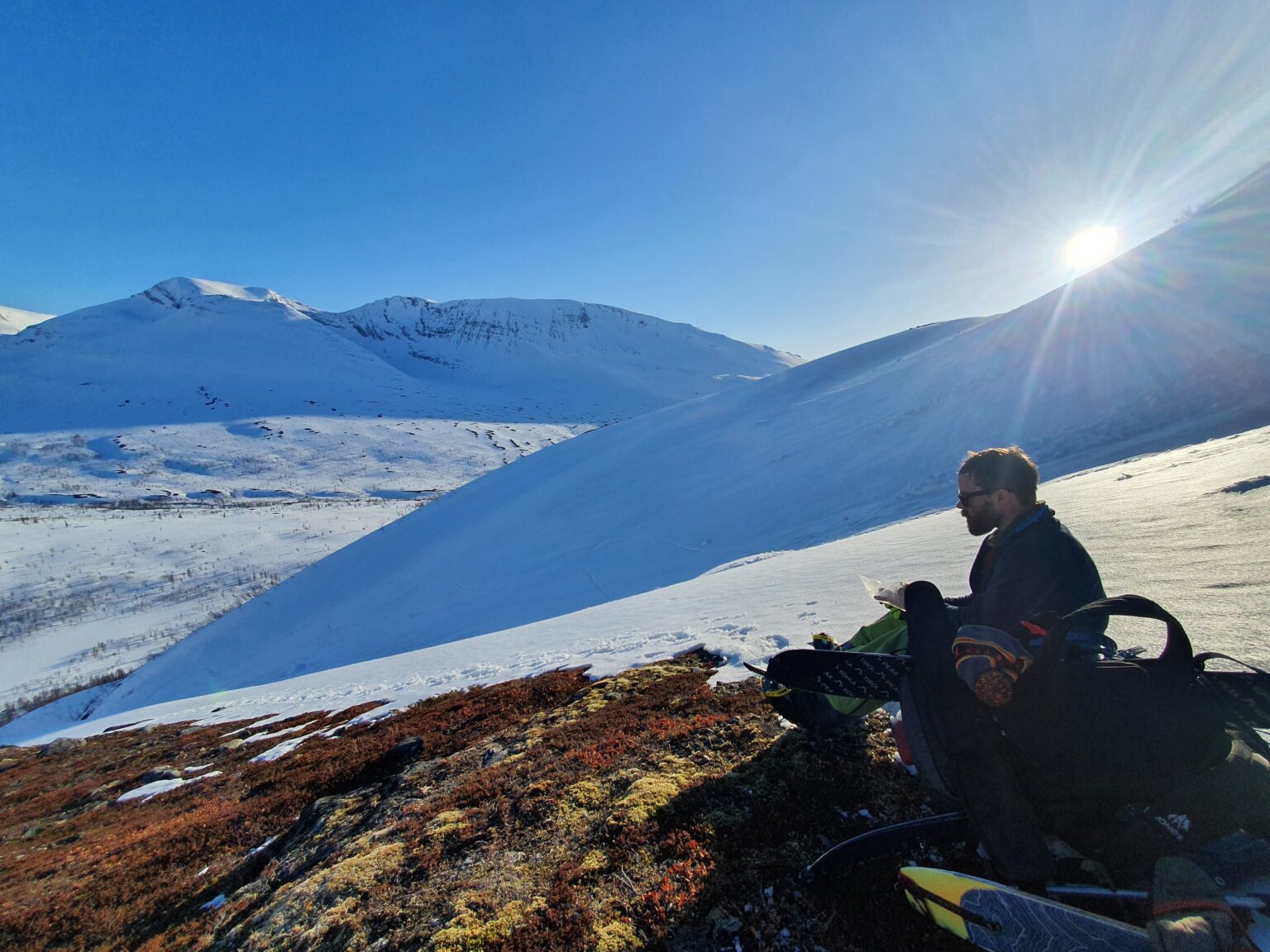 Taking a rest before climbing the south chute on Tamokfjellet